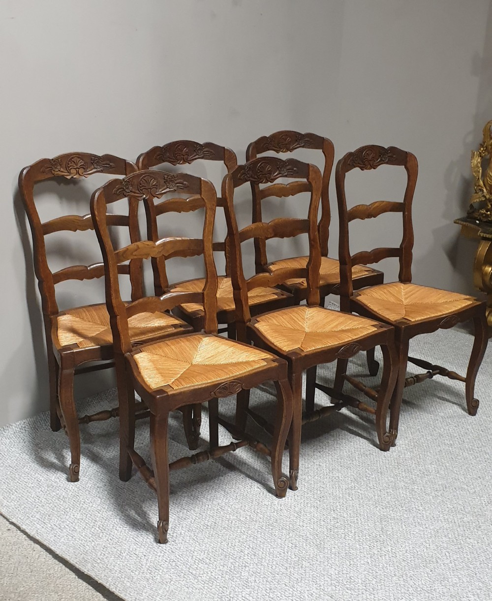 A SET OF SIX FRENCH KITCHEN CHAIRS 