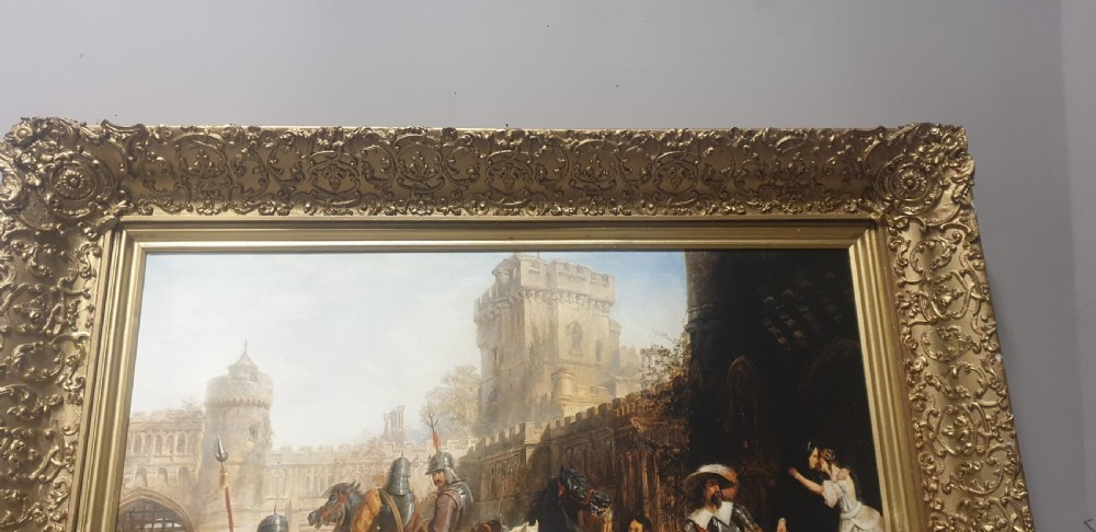 A large Victorian gilded picture frame with ornate relief moulding containing a historical narrative print. View II
