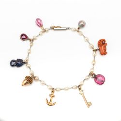 ANTIQUE EDWARDIAN PLATINUM GOLD PEARL AND GEM CHARM BRACELET CIRCA 1900'S