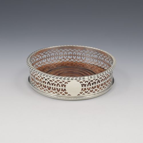 fig 1. Edwardian Pierced Silver Wine Bottle Coaster D & J Welby 1905