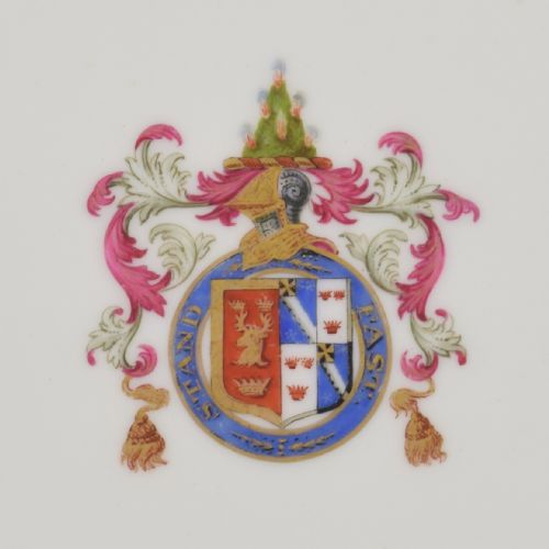 fig 1. A Victorian Copeland porcelain cabinet plate featuring a bright cobalt blue border, gilt ornamentation, and a central heraldic coat of arms on a white ceramic ground.
