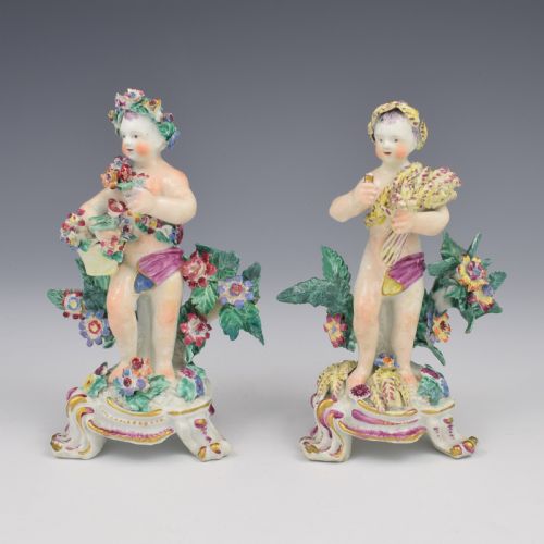 fig 1. A set of four 18th-century Bow soft-paste porcelain figures representing the seasons, depicting putti on rococo scroll bases with colourful floral bocage.