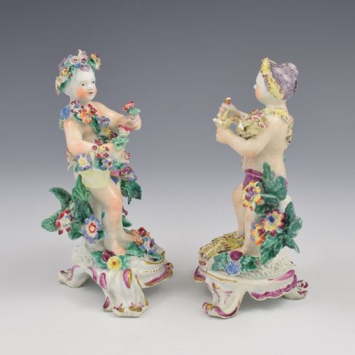 fig 4. A set of four 18th-century Bow soft-paste porcelain figures representing the seasons, depicting putti on rococo scroll bases with colourful floral bocage.