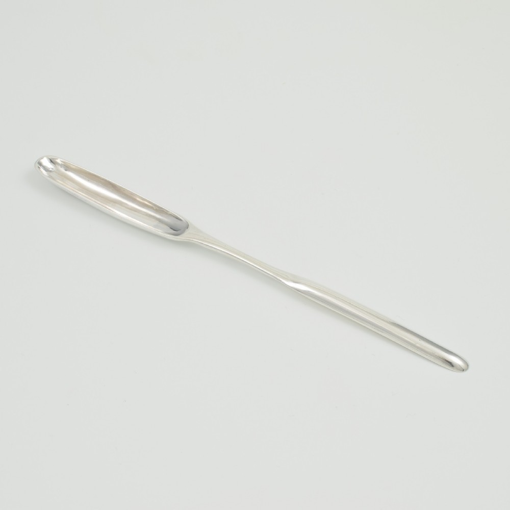 A George II sterling silver double-ended marrow scoop featuring a smooth polished surface and elongated spoon bowls. View III