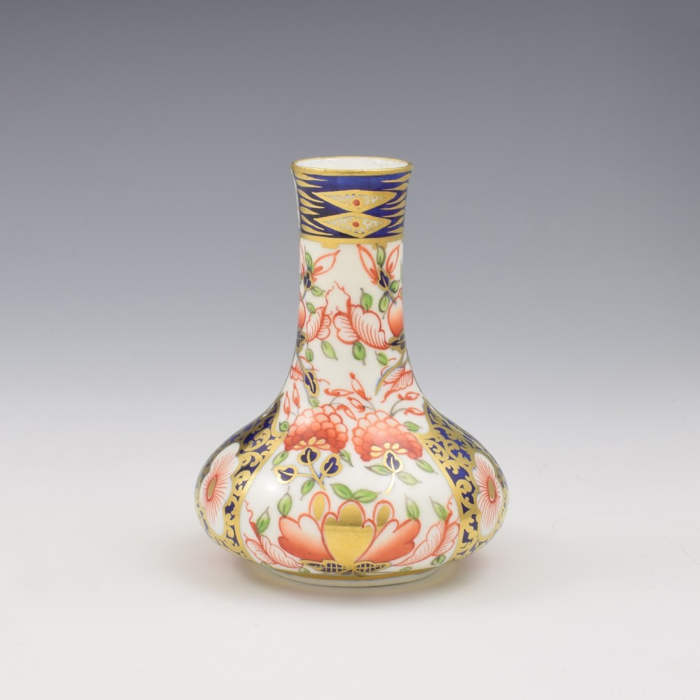 Victorian Stevenson and Hancock Derby porcelain bud vase decorated with rich cobalt blue, iron red floral Imari pattern, and gilding. View II