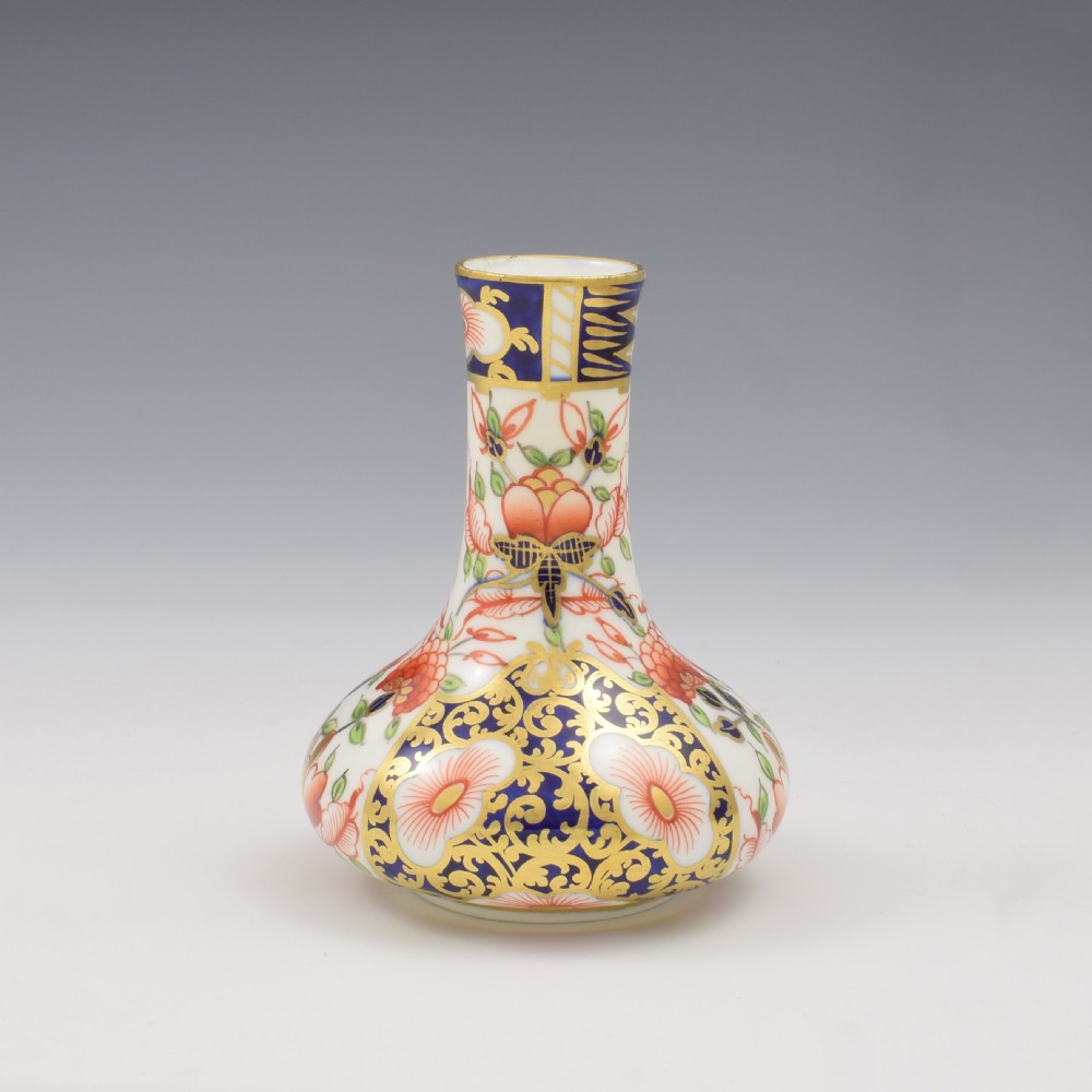 Victorian Stevenson and Hancock Derby porcelain bud vase decorated with rich cobalt blue, iron red floral Imari pattern, and gilding. View III