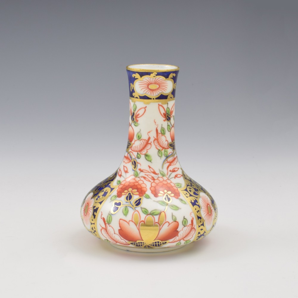 Victorian Stevenson and Hancock Derby porcelain bud vase decorated with rich cobalt blue, iron red floral Imari pattern, and gilding. View IV