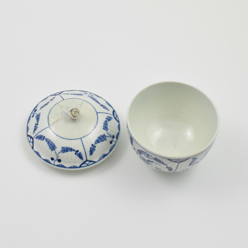 A fluted blue and white eighteenth-century Worcester porcelain sucrier with a sculpted flower finial and floral Immortelle pattern. View VIII