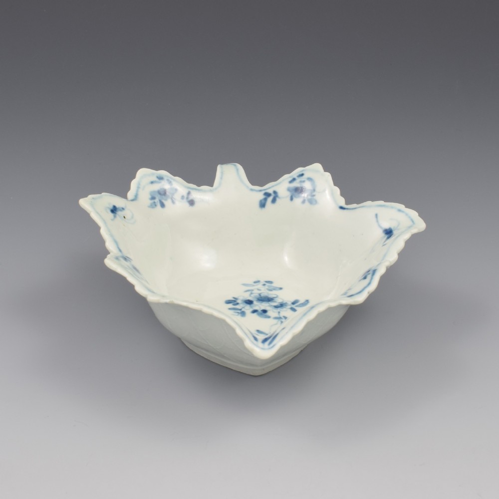 An 18th-century leaf-moulded soft-paste porcelain pickle dish with underglaze cobalt blue floral and leaf decoration. View VII