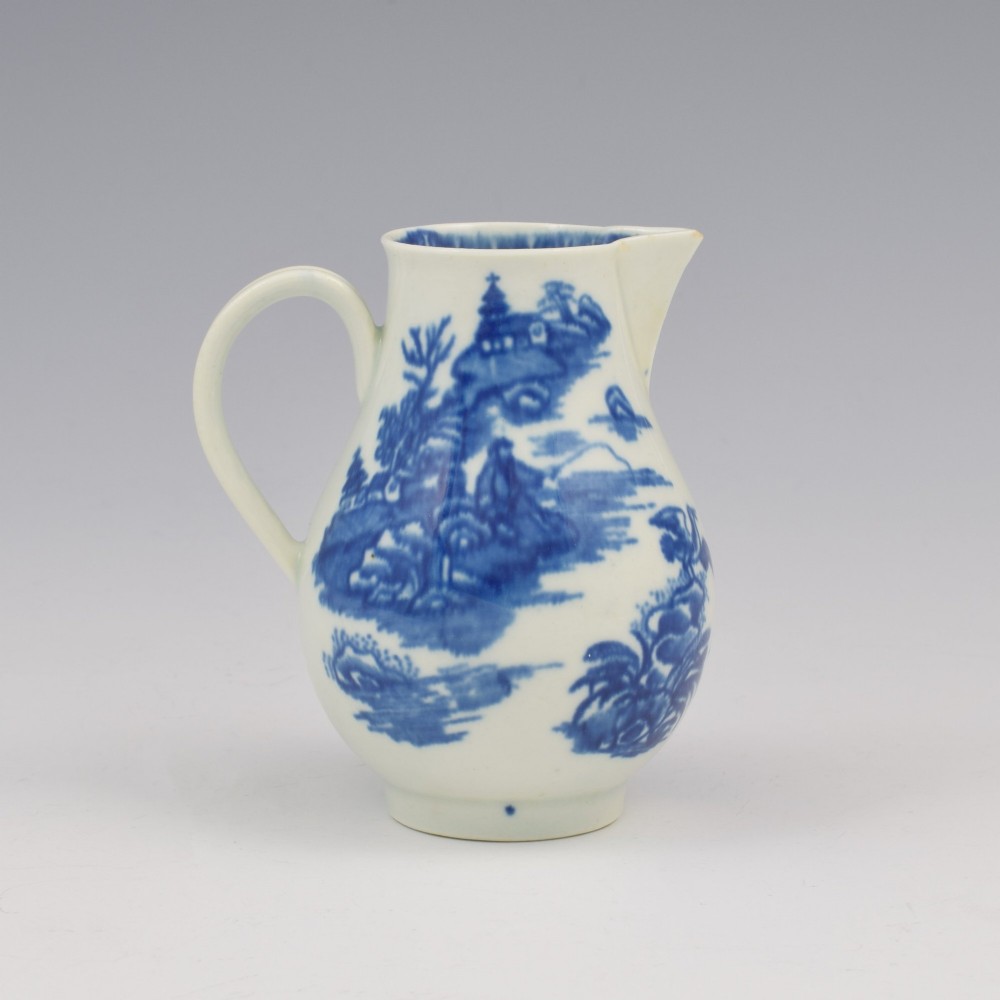 A Georgian First Period Worcester porcelain sparrow beak milk jug decorated with a cobalt blue underglaze fisherman pattern. View V