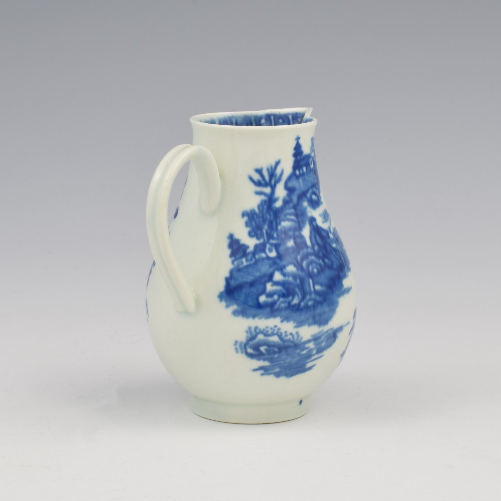 A Georgian First Period Worcester porcelain sparrow beak milk jug decorated with a cobalt blue underglaze fisherman pattern. View VI