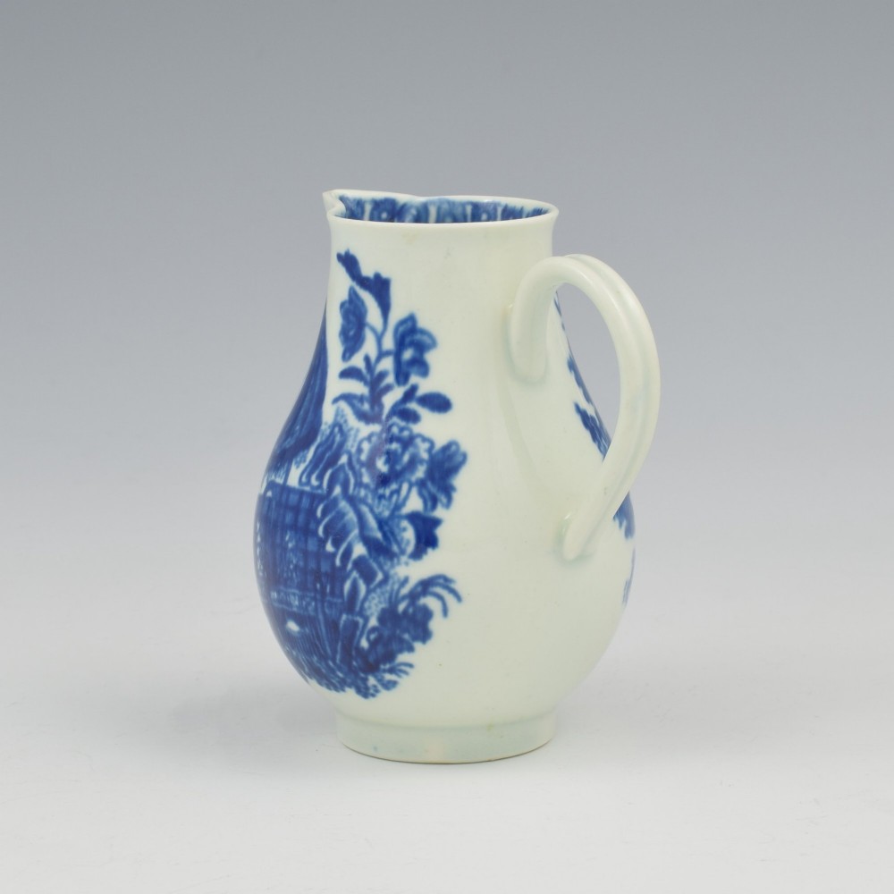 A Georgian First Period Worcester porcelain sparrow beak milk jug decorated with a cobalt blue underglaze fisherman pattern. View VIII