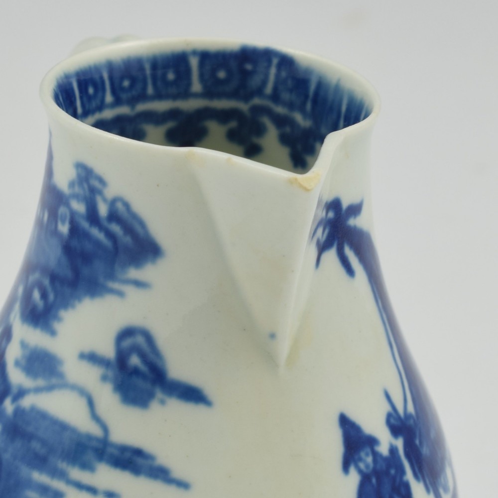 A Georgian First Period Worcester porcelain sparrow beak milk jug decorated with a cobalt blue underglaze fisherman pattern. View IX