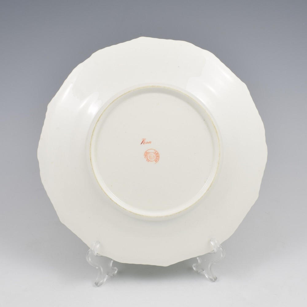 A Georgian Bloor Derby porcelain dessert plate with an apple green rim, a painted Marquess coronet crest, and a central hand-painted pink rose with insects. View VII