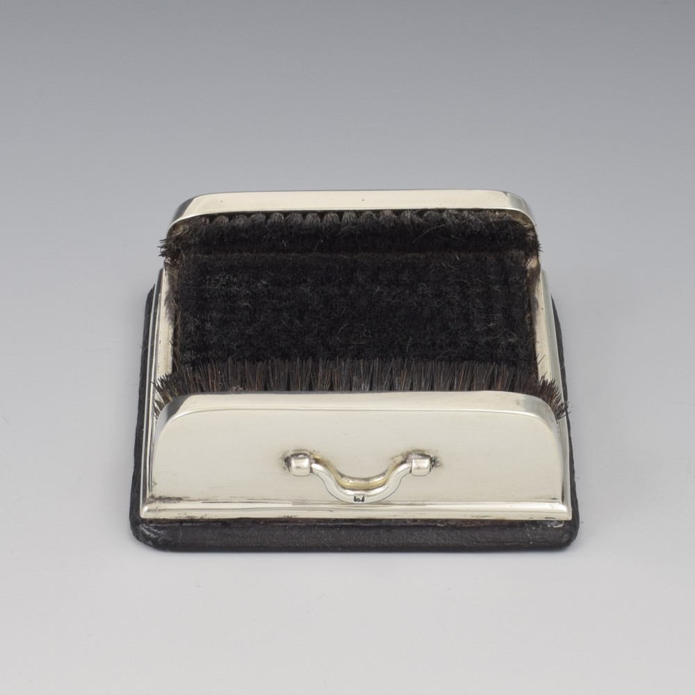 An antique Victorian sterling silver novelty pen wipe in the form of a miniature boot scraper with black bristles. View II