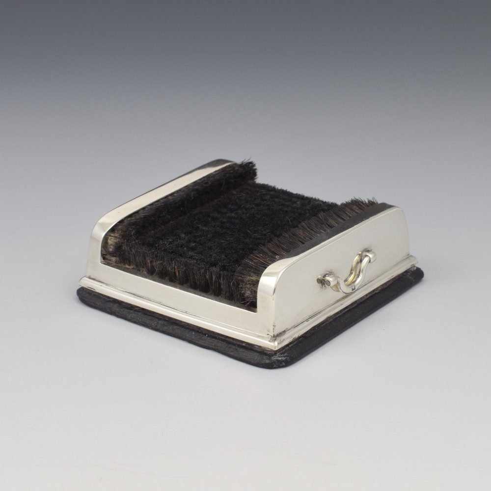 An antique Victorian sterling silver novelty pen wipe in the form of a miniature boot scraper with black bristles. View IV
