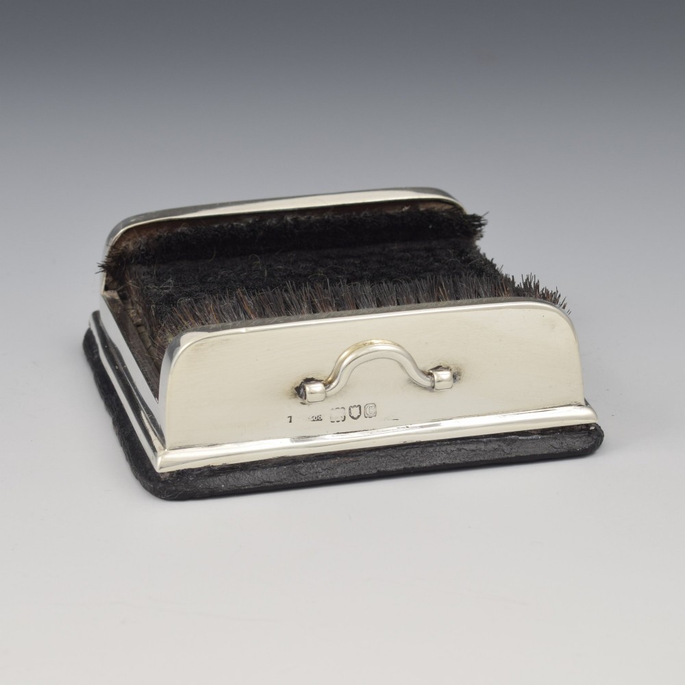 An antique Victorian sterling silver novelty pen wipe in the form of a miniature boot scraper with black bristles. View IX