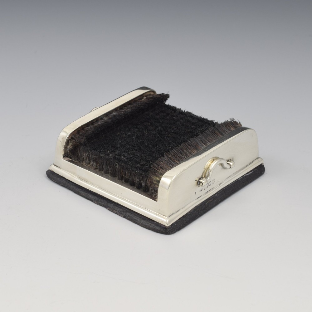 An antique Victorian sterling silver novelty pen wipe in the form of a miniature boot scraper with black bristles. View X