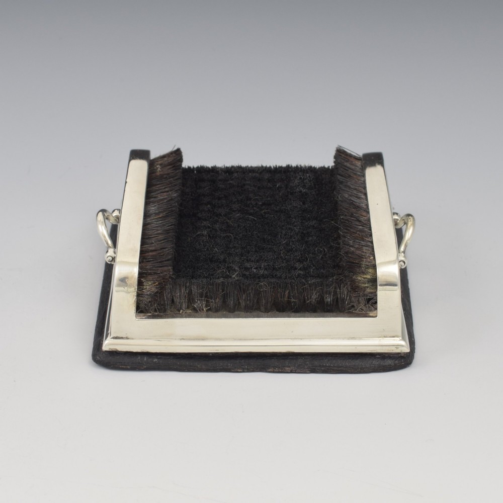 An antique Victorian sterling silver novelty pen wipe in the form of a miniature boot scraper with black bristles. View XI