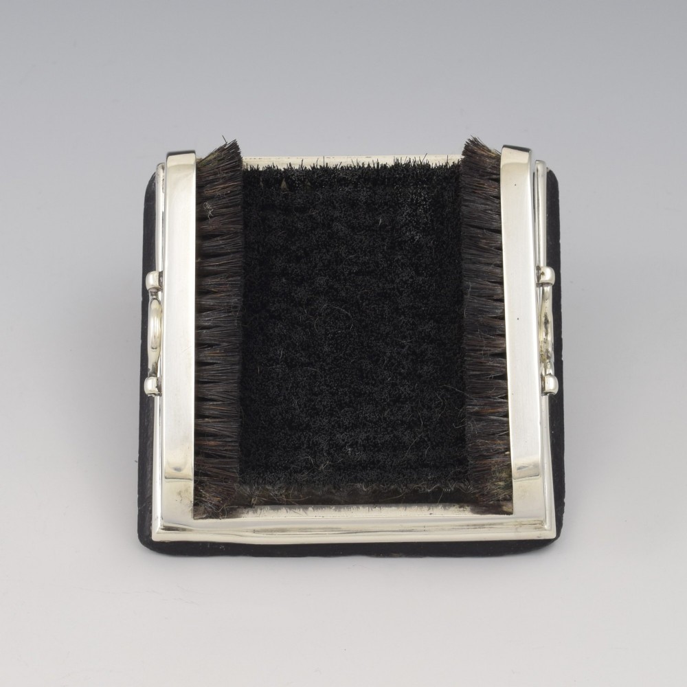 An antique Victorian sterling silver novelty pen wipe in the form of a miniature boot scraper with black bristles. View XII