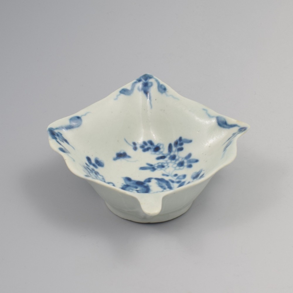 An 18th-century leaf-shaped soft-paste porcelain pickle dish featuring hand-painted chinoiserie motifs in underglaze blue. View IV