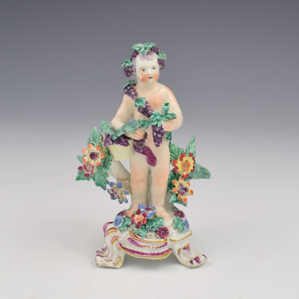 A set of four 18th-century Bow soft-paste porcelain figures representing the seasons, depicting putti on rococo scroll bases with colourful floral bocage. View XXIV