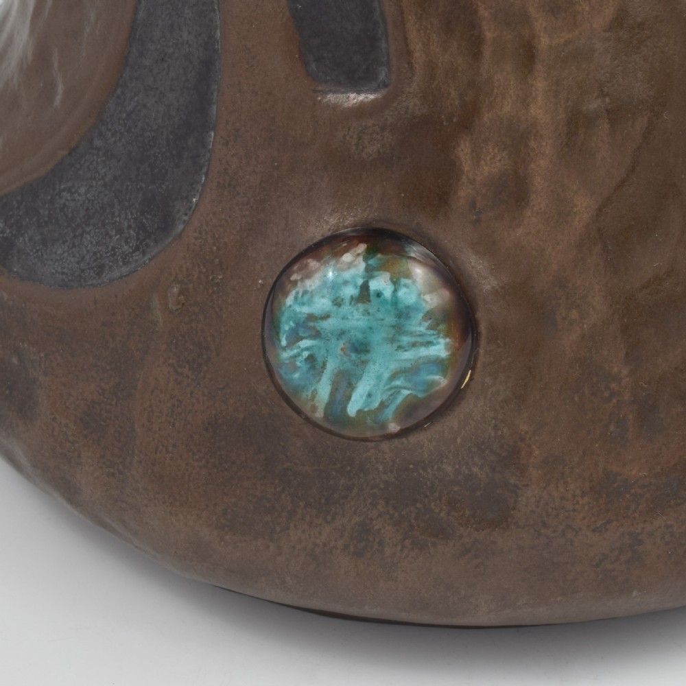 An Art Nouveau brown ceramic vase featuring a metallic copper effect surface, organic twin handles, flared rim, and inset colourful glazed cabochons. View IX