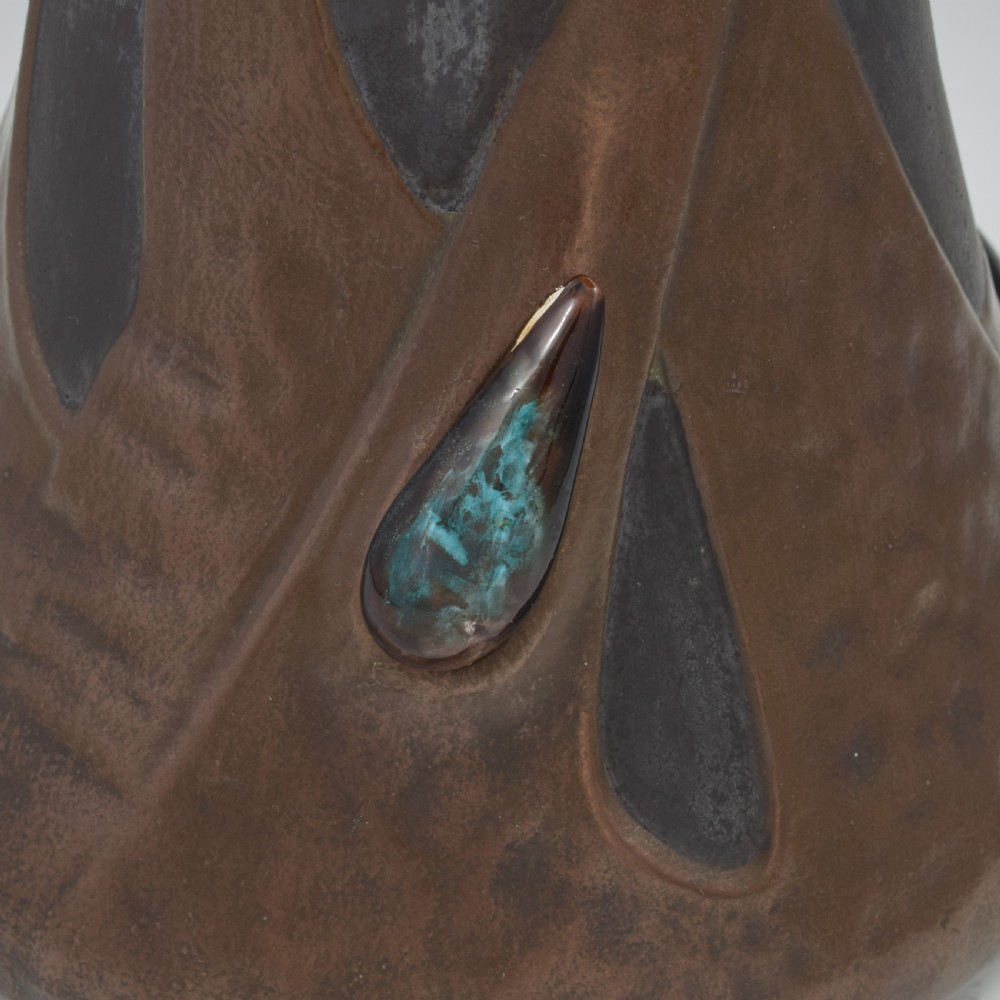 An Art Nouveau brown ceramic vase featuring a metallic copper effect surface, organic twin handles, flared rim, and inset colourful glazed cabochons. View XI