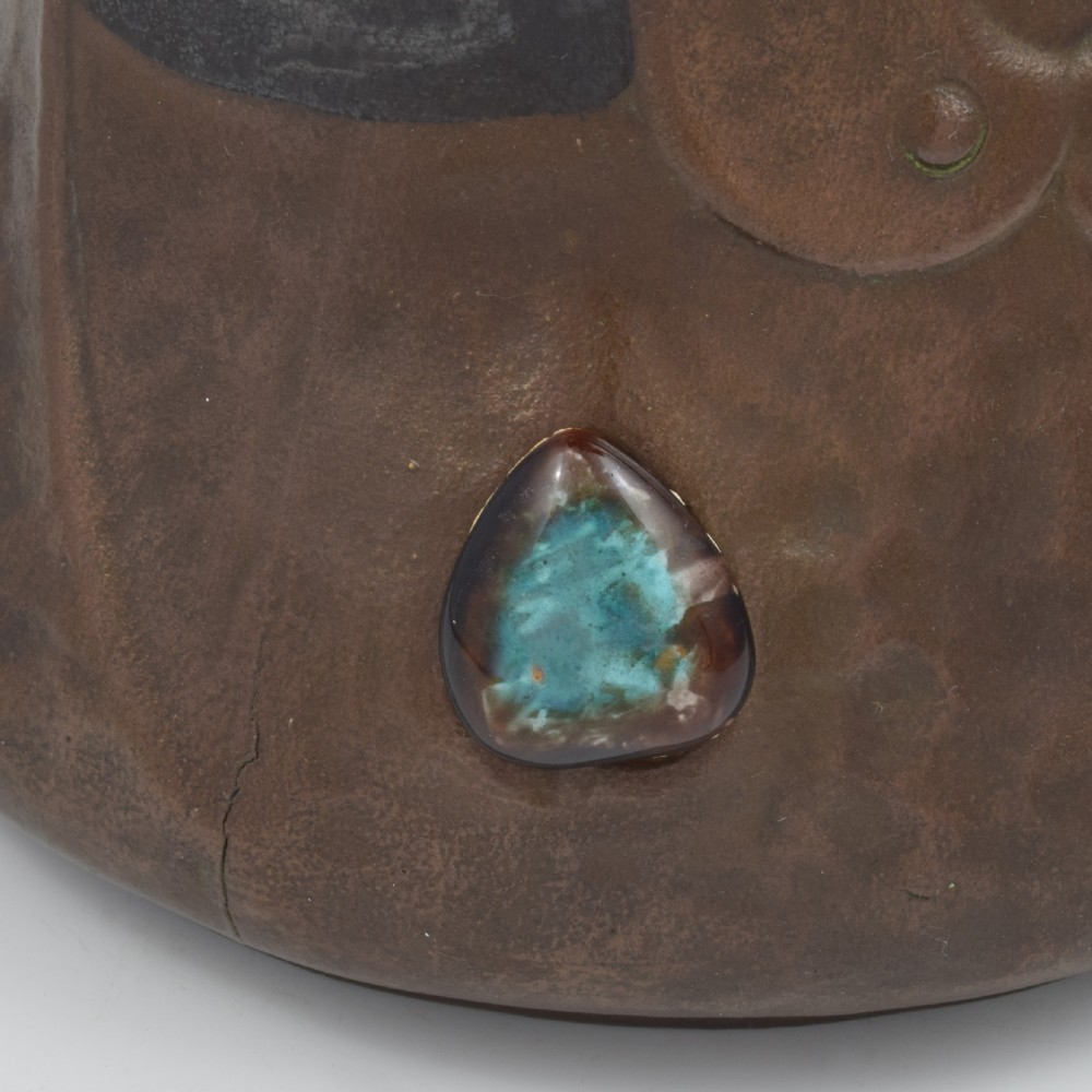 An Art Nouveau brown ceramic vase featuring a metallic copper effect surface, organic twin handles, flared rim, and inset colourful glazed cabochons. View XII