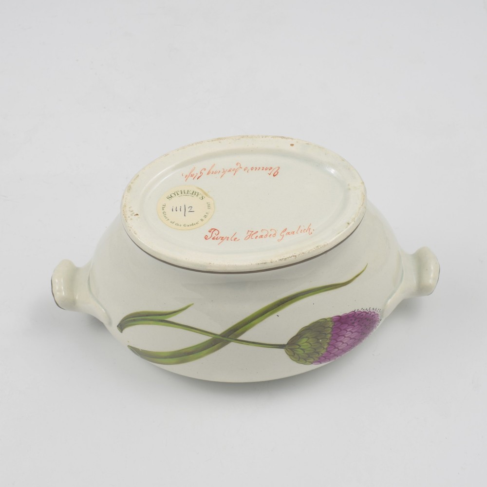 A Georgian cream pearlware lidded sauce tureen hand painted with botanical flowers and featuring scroll handles and a scroll finial. View XI