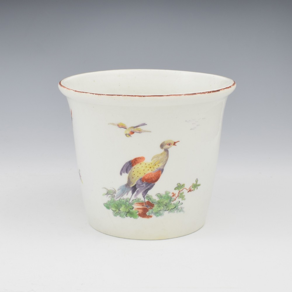 An eighteenth-century white soft-paste porcelain flower pot and matching shallow stand, decorated with hand-painted polychrome birds and insects. View VI