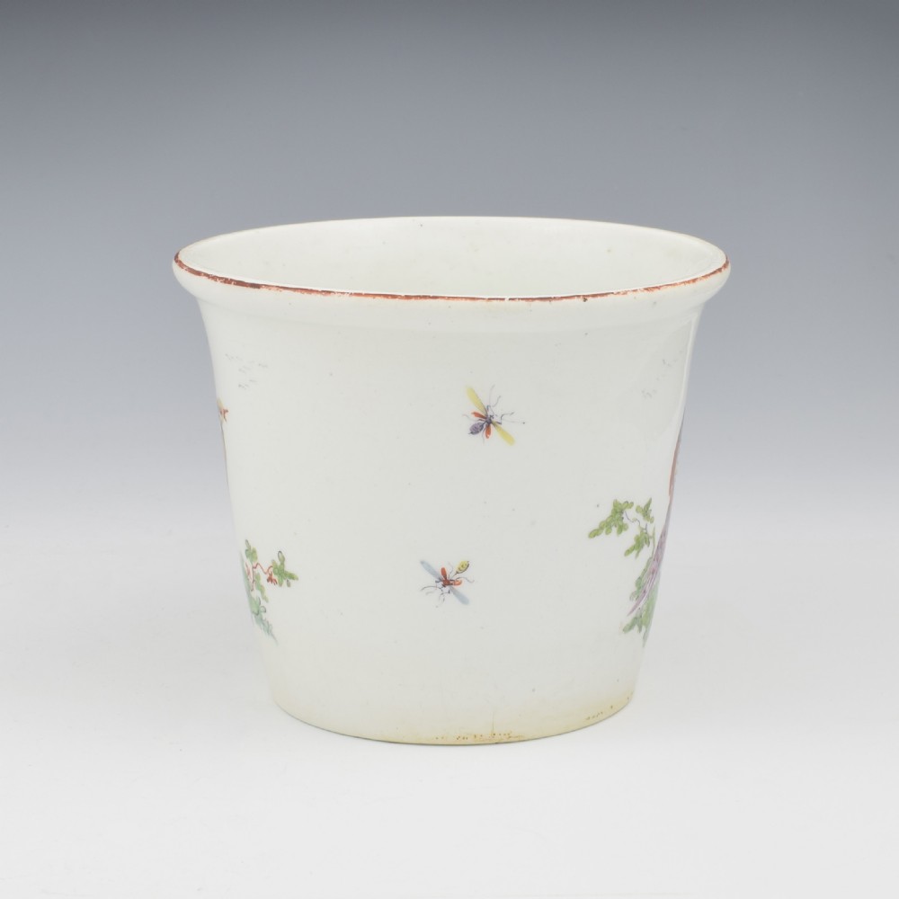 An eighteenth-century white soft-paste porcelain flower pot and matching shallow stand, decorated with hand-painted polychrome birds and insects. View VII