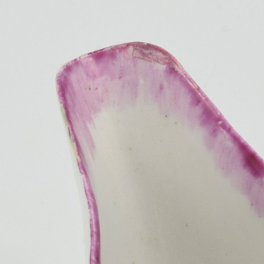 An eighteenth-century Bow soft-paste porcelain fluted sauce boat with hand-painted floral sprigs and a magenta feathered rim. View XIII