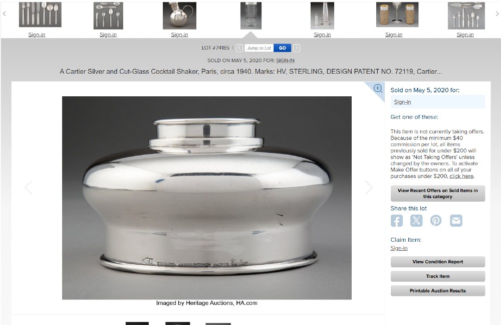 An Art Deco cocktail shaker featuring a clear cut glass body with geometric facet patterns and a polished sterling silver mount and octagonal cap. View XIV