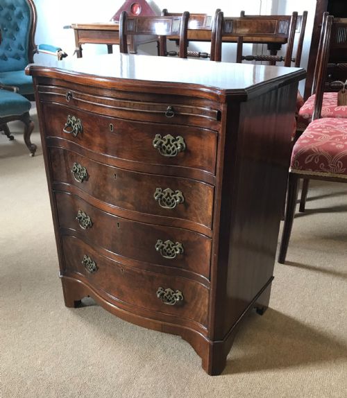Walnut Serpentine Chest
