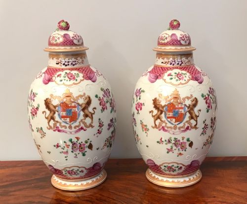 A Decorative Pair of Armorial Vases