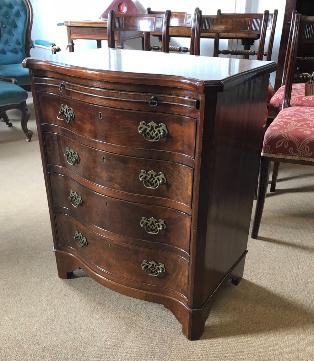  Walnut Serpentine chest 