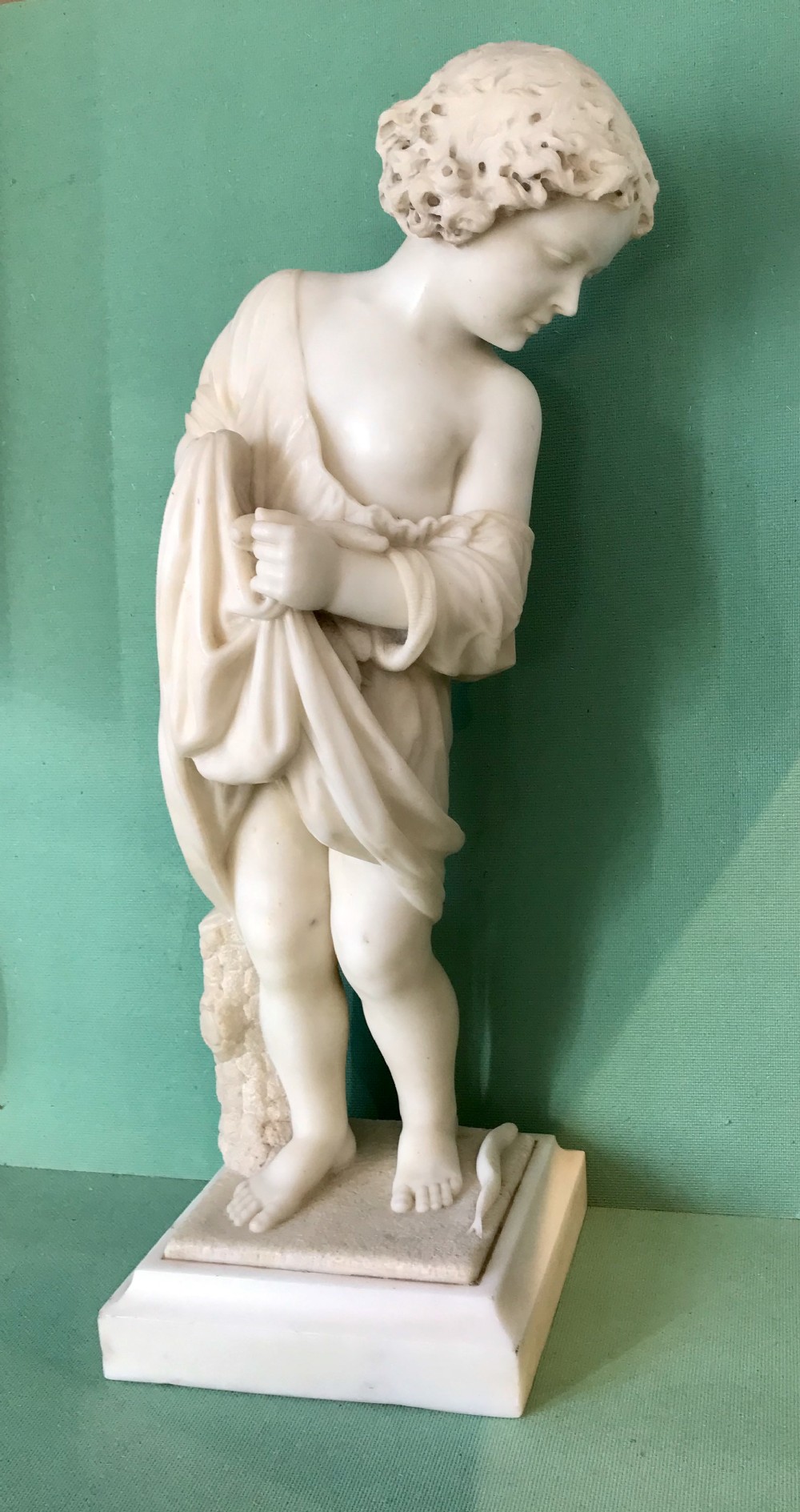 Exquisite 19ct marble sculpture of a child gathering fish