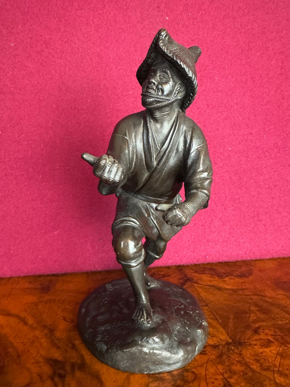 Bronze figure of a Japanese fisherman circa 1890. Japanese bronze.. View IV