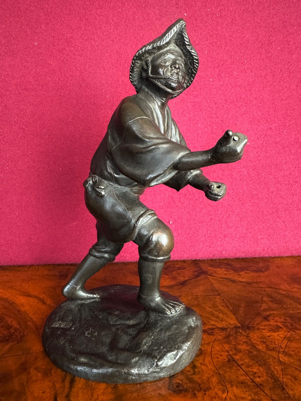 Bronze figure of a Japanese fisherman circa 1890. Japanese bronze.. View V