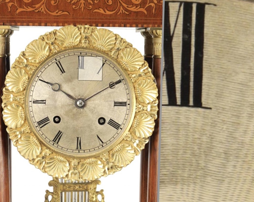 A late 19th-century French portico mantel clock crafted from dark wood with floral marquetry inlays, featuring twin columns and a decorative brass pendulum. View III