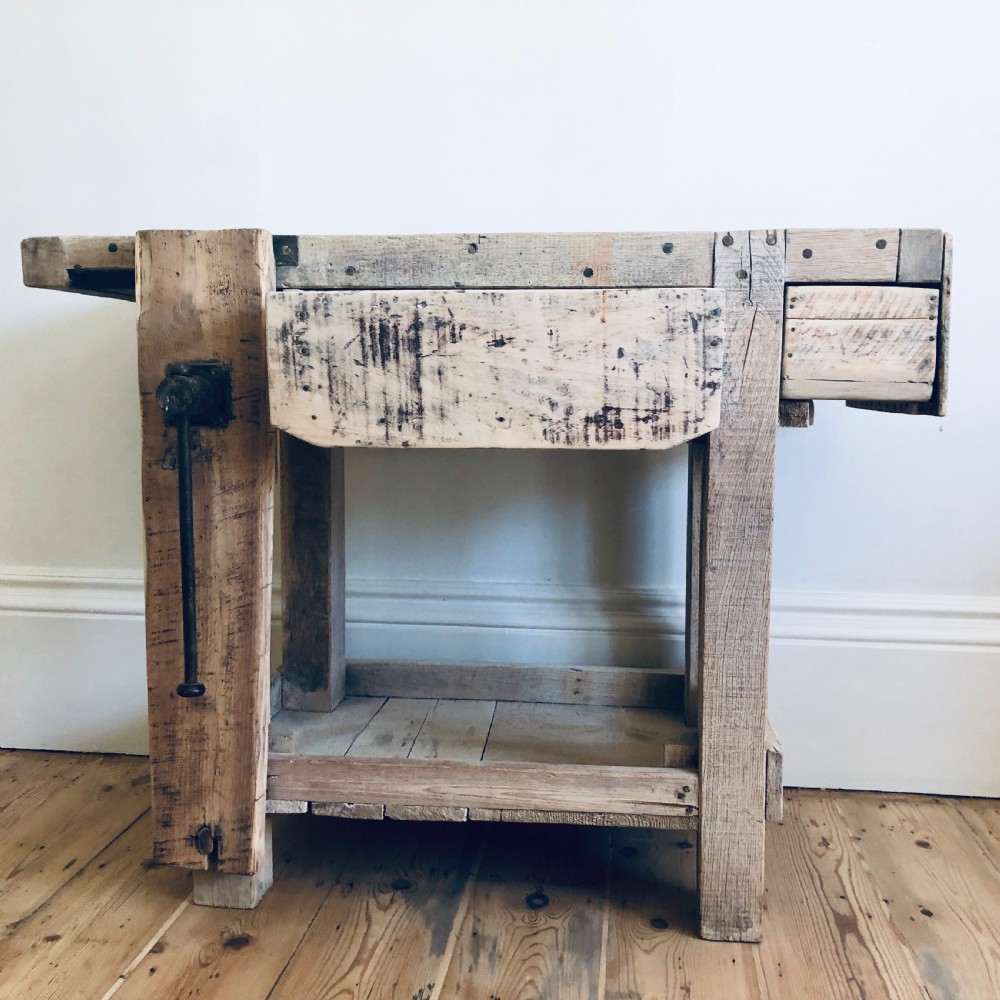 Antique French industrial work bench with vice