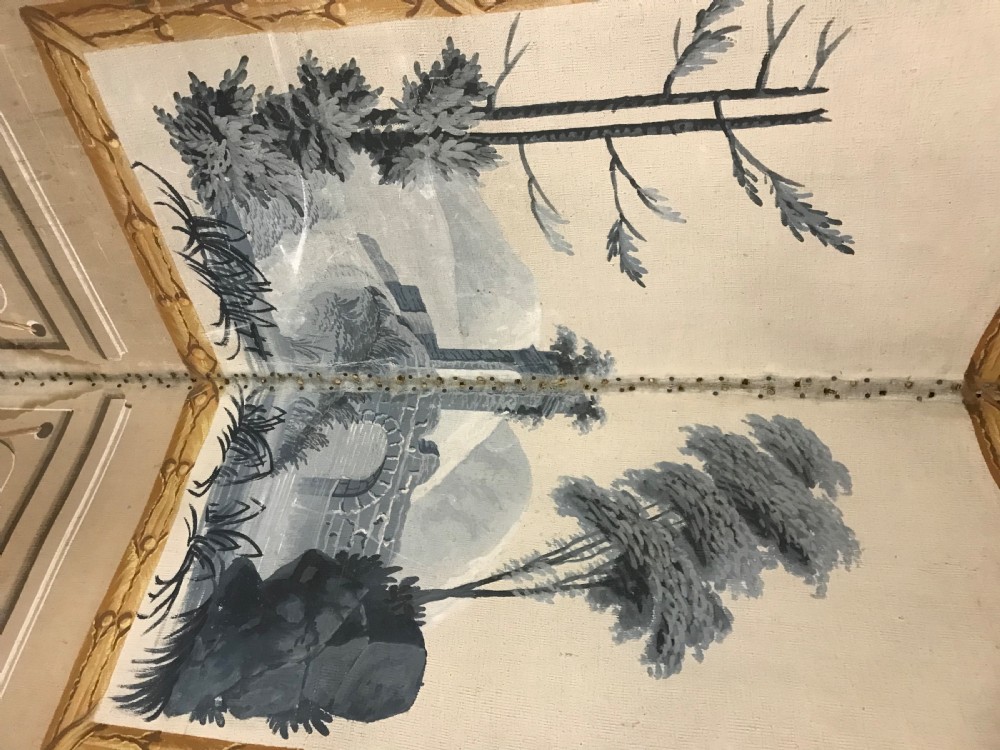 A four-panel French folding screen featuring hand-painted monochrome landscape scenes above simulated wooden wall panelling. View III