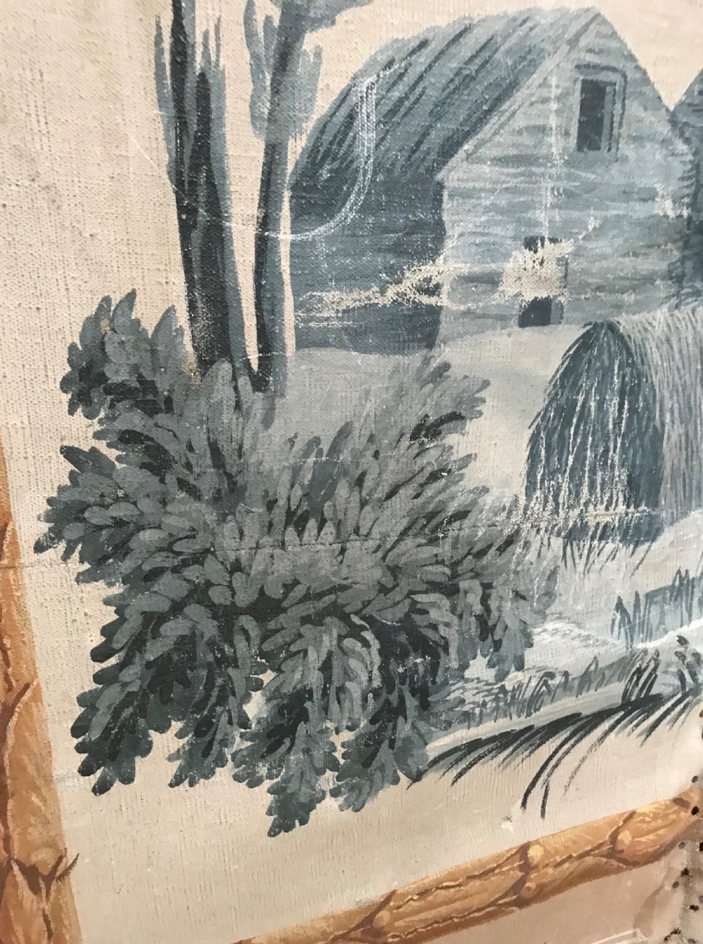 A four-panel French folding screen featuring hand-painted monochrome landscape scenes above simulated wooden wall panelling. View XII