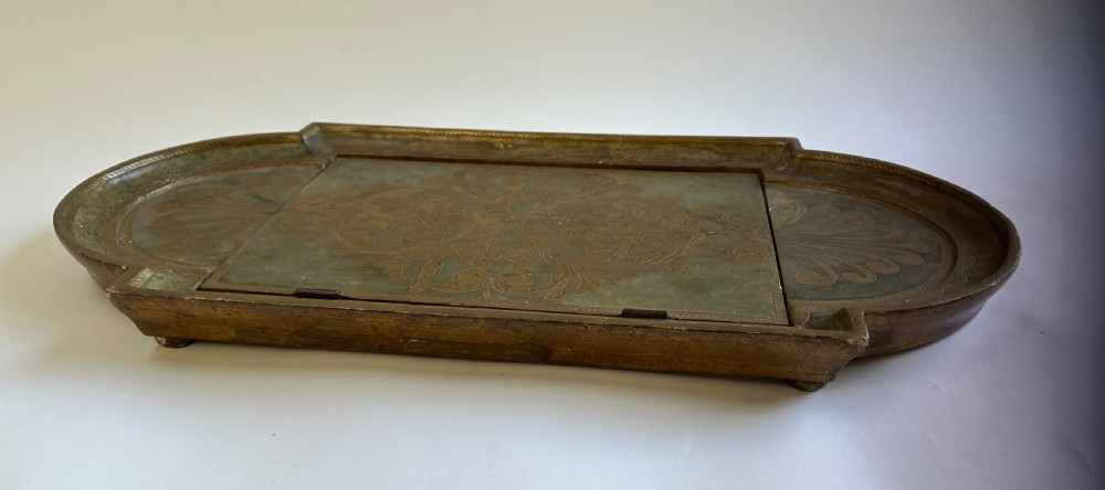 An antique Florentine painted and giltwood tabletop book stand with an open book resting on its angled surface. View IV