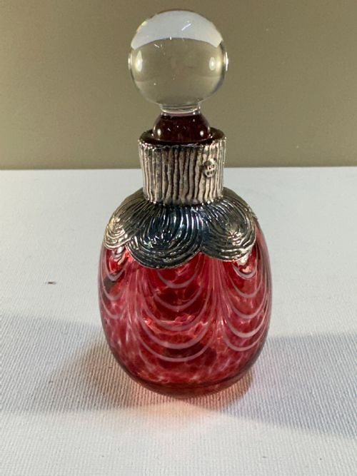 Glass perfume bottle glass stopper with Irish silver silver work detail hall marked original 