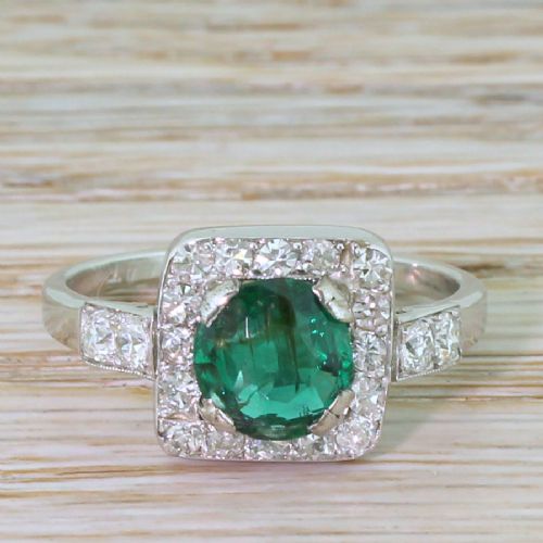 fig 1. Art Deco 1.08 Carat Emerald & 0.42 Carat Diamond Cluster Ring, circa 1930