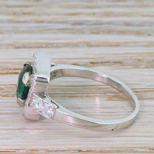 fig 2. Art Deco 1.08 Carat Emerald & 0.42 Carat Diamond Cluster Ring, circa 1930