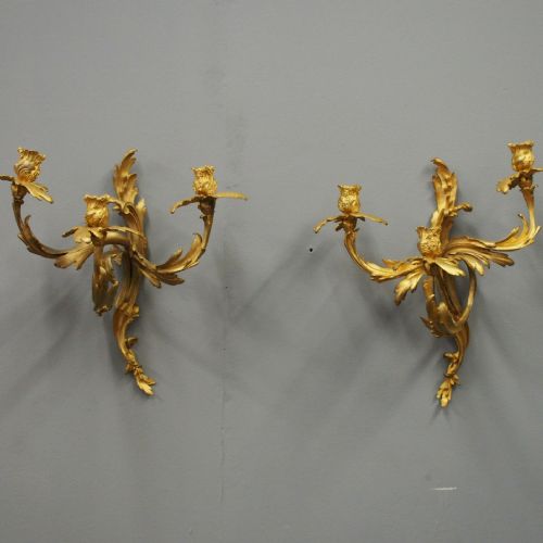 Pair of Louis XV Style Cast Brass and Gilded Sconces