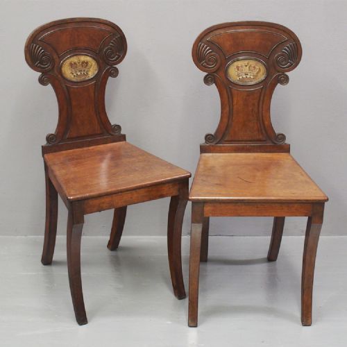 Pair of Regency Mahogany Hall Chairs with Painted Coronet